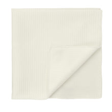 Load image into Gallery viewer, An off-white (pear) herringbone textured pocket square folded into a square, with one corner turned over to show the fabric, set against a plain white background.
