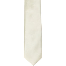 Load image into Gallery viewer, The front of a pearl skinny tie, laid flat