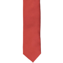 Load image into Gallery viewer, The front of a persimmon tie, laid flat