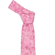 Load image into Gallery viewer, A pink necktie with a darker pink floral damask pattern, styled in a knot on a solid white background.
