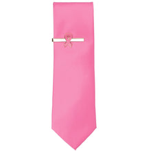 Load image into Gallery viewer, A pink ribbon tie bar on a pink solid color necktie