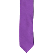 Load image into Gallery viewer, The front of a plum violet skinny tie, laid flat