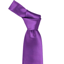 Load image into Gallery viewer, Close-up of a solid plum violet necktie knot, highlighting the rich purple tone and subtle ribbed texture of the fabric