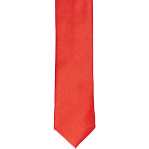 The front of a poppy skinny tie, laid flat