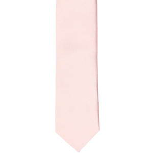 The front of a princess pink skinny tie, laid flat