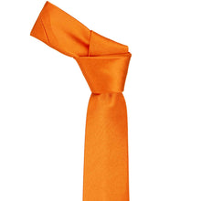 Load image into Gallery viewer, Knotted orange slim necktie on a white background