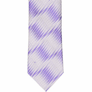 The front of a purple and silver snakeskin pattern tie, laid flat