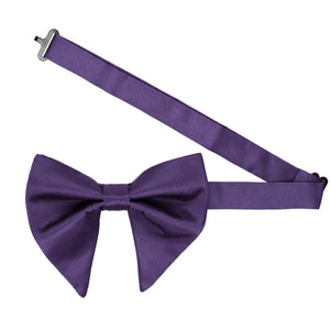 A pre-tied oversized imperial bow tie with the band collar open