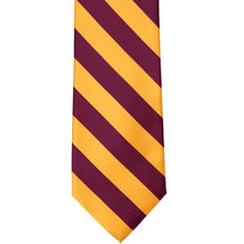 Load image into Gallery viewer, Front view of a raspberry and golden yellow striped tie, laid out flat