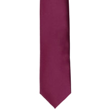 Load image into Gallery viewer, The front of a raspberry skinny tie, laid flat