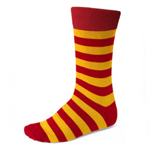 Load image into Gallery viewer, A single crew sock with alternating horizontal stripes of red and golden yellow, featuring a solid red ribbed cuff, toe, and heel.