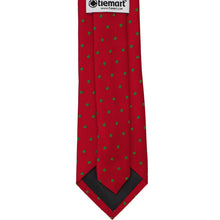 Load image into Gallery viewer, Back of a red tie with green polka dots on a white background