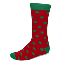 Load image into Gallery viewer, A red and green polka dotted sock on a white background