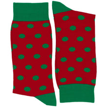 Load image into Gallery viewer, A pair of folded red and green polka dot socks