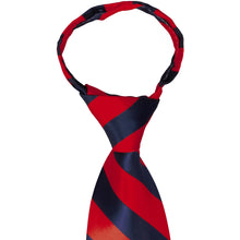 Load image into Gallery viewer, A closeup of the knot on a red and navy blue striped zipper tie