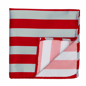 A red and silver striped pocket square with the corner folder up