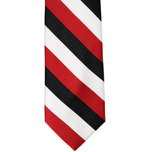Load image into Gallery viewer, The front of a red, black and white striped tie