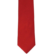 Load image into Gallery viewer, The front of a red herringbone slim tie, laid out flat