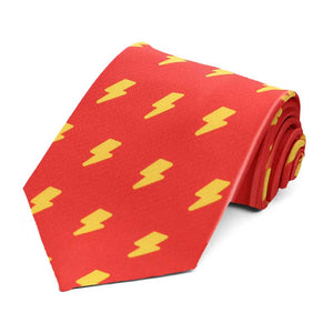A red tie with yellow lightning bolts, rolled to show off the design