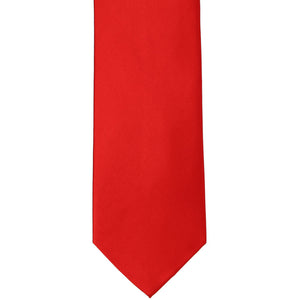 The front of a red silk tie, laid out flat