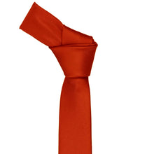 Load image into Gallery viewer, Knot on a red skinny staff tie