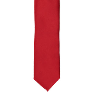 Red skinny tie, laid out flat