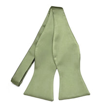 Load image into Gallery viewer, A light sage green satin self-tie bow tie, untied, displayed against a solid white background.