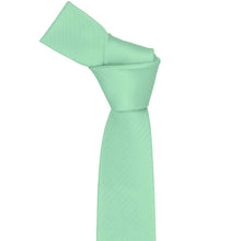 Load image into Gallery viewer, Knot on a seafoam necktie on a white background