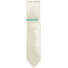 Load image into Gallery viewer, A solid seafoam tie bar on an ivory slim tie  Edit alt text
