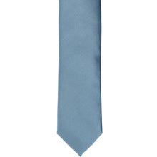 Load image into Gallery viewer, The front of a serene skinny tie, laid flat