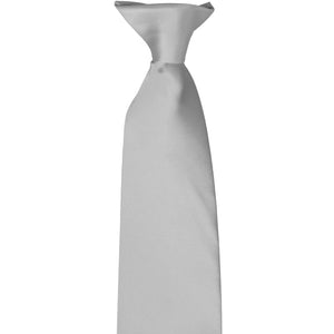 The knot on a silver clip-on men's tie