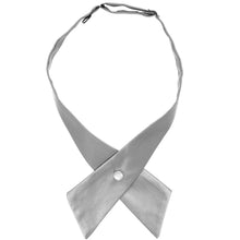 Load image into Gallery viewer, A silver crossover tie with a decorative pearl snap at the center, displayed on a clean white background.