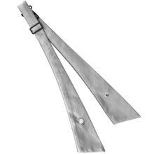 Load image into Gallery viewer, A silver crossover tie with a black metal buckle and silver snap buttons, displayed unsnapped on a clean white background.