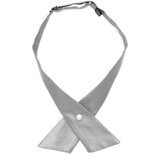 Load image into Gallery viewer, A silver satin crossover tie with a single pearl closure, laid flat against a solid white background.