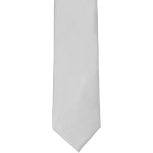 The front of a silver silk slim tie, laid out flat