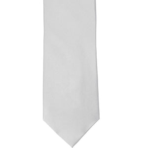 The front of a silver solid tie, laid flat
