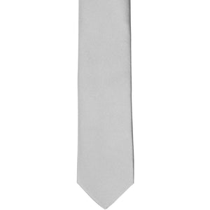 Front view of a silver skinny tie laid flat