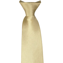 Load image into Gallery viewer, The knot on the front of a sparkling champagne clip-on tie, laid flat