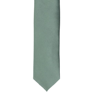 The front of a stormy gray skinny tie, laid out flat
