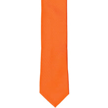 Load image into Gallery viewer, The front of a tangerine skinny solid tie, laid flat