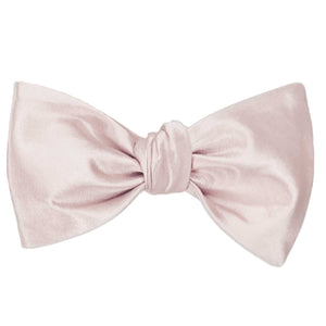 Tea rose pink self-tie bow tie, tied