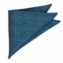 Load image into Gallery viewer, A folded teal blue pocket square with a subtle textured grid pattern, displayed on a clean white background.