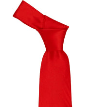 Load image into Gallery viewer, Red knotted necktie on a white background