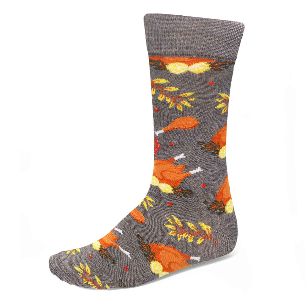 A gray men's crew sock with a cooked turkey pattern