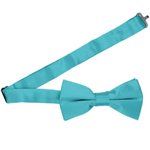 Load image into Gallery viewer, A turquoise bow tie with the band collar open