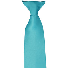 Load image into Gallery viewer, The pre-tied knot on a turquoise clip-on tie