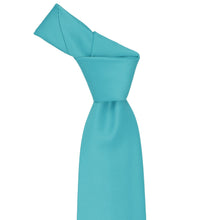 Load image into Gallery viewer, Turquoise knotted necktie on a white background