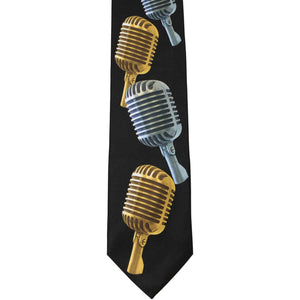 The front of a black tie with large silver and black vintage microphones