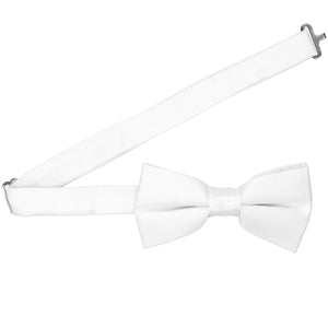 A solid white pre-tied bow tie with the collar open 