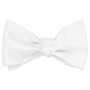 Solid white self-tie bow tie, tied